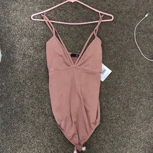 Roasted pink body suit